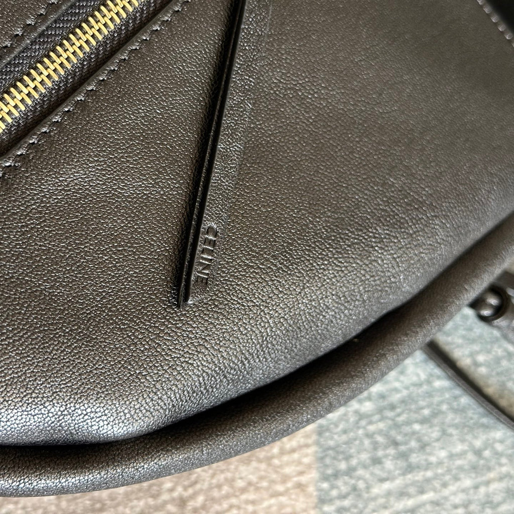 CELINE 25S HALFMOON SOFT TRIOMPHE BAG 46MM IN BLACK SUPPLE SHINY LAMBSKIN