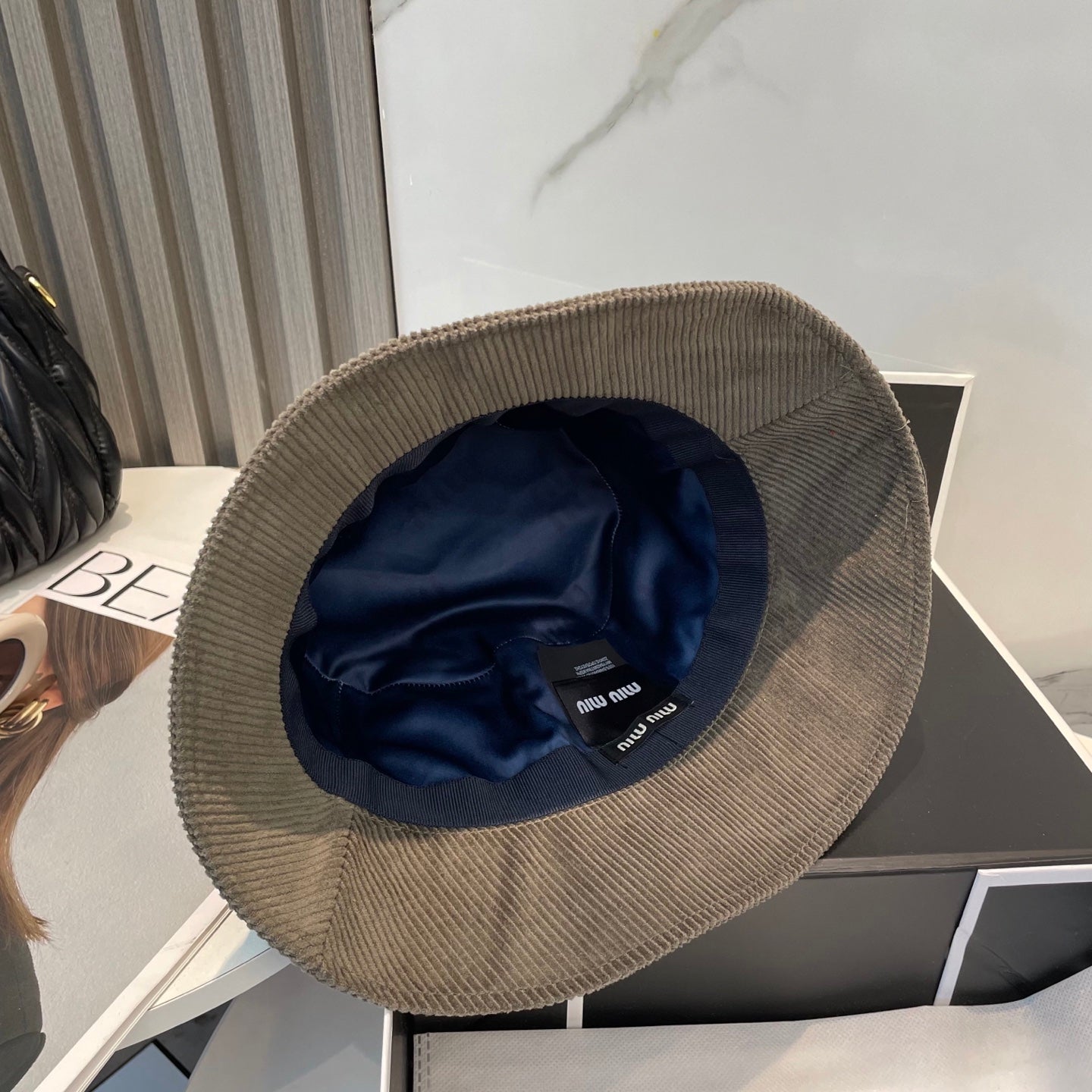 MIUMIU BUCKET IN MUTED BROWN VELVET WITH LOGO
