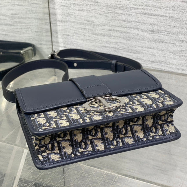 MONTAIGNE EAST-WEST 21 BAG WITH CHAIN IN NAVY BLUE LAMBSKIN AND MONOGRAM JACQUARD