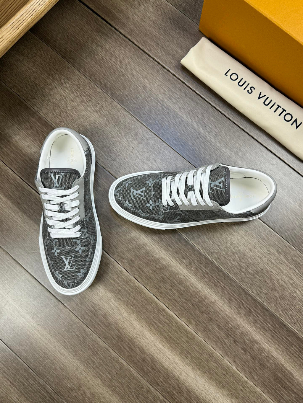 LV TRAINER SNEAKER IN GREY PASTEL MONOGRAM DENIM