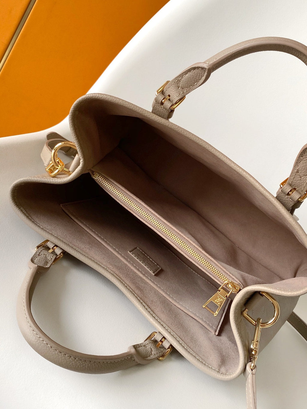 LV 25S BABYLONE TOTE BAG 32 IN TOURTERELLE GREY CALFSKIN GOLD HARDWARE