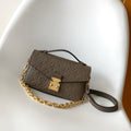 POCHETTE METIS EAST WEST 22 IN BROWN MONOGRAM EMBOSSED CALFSKIN