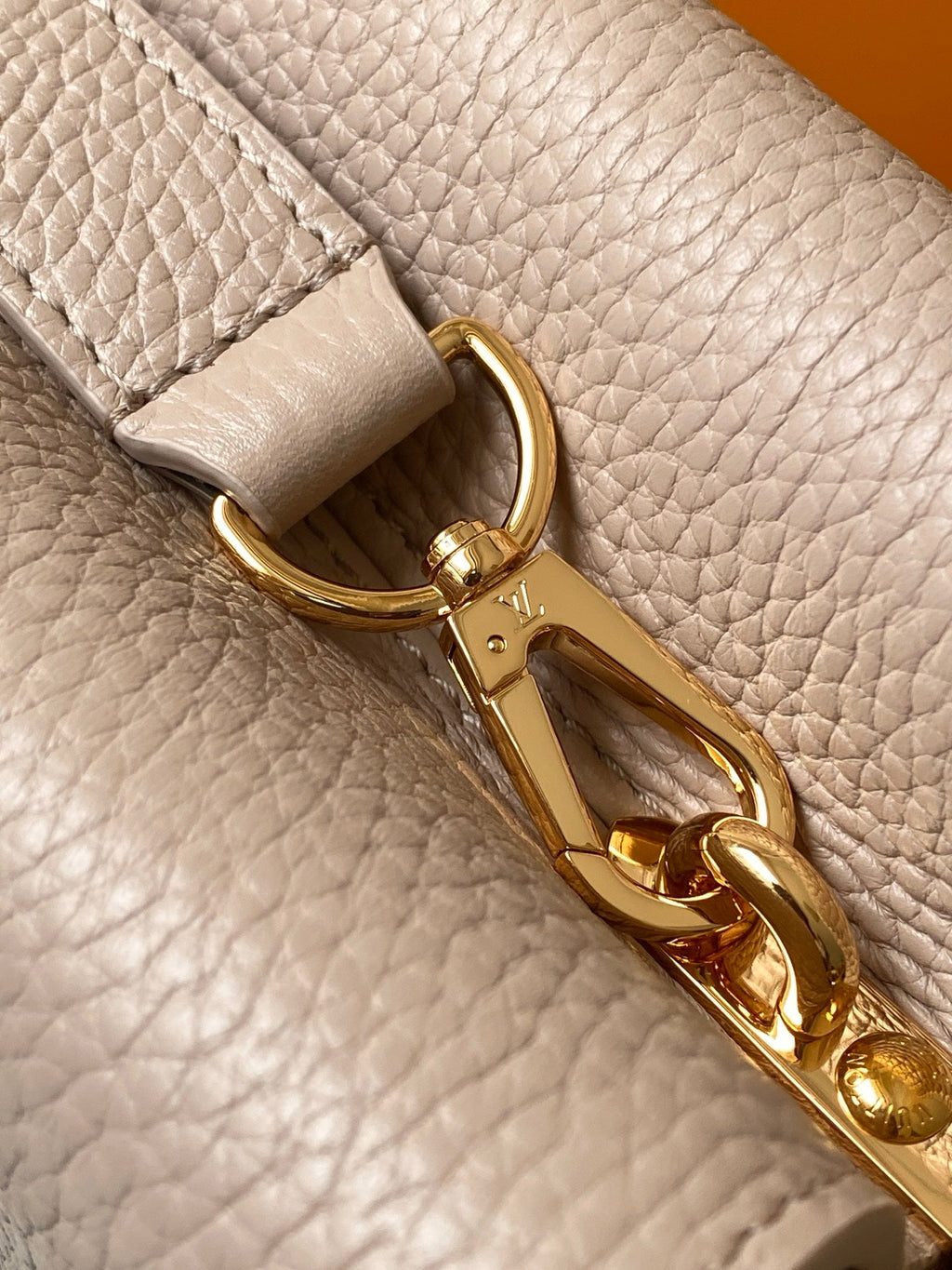 LV 26S CAPUCINES BAG 27 IN GRAYISH BEIGE TAURILLON CALFSKIN WITH GOLD HARDWARE