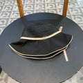 STRIPED BUCKET HAT IN BLACK COTTON 434998