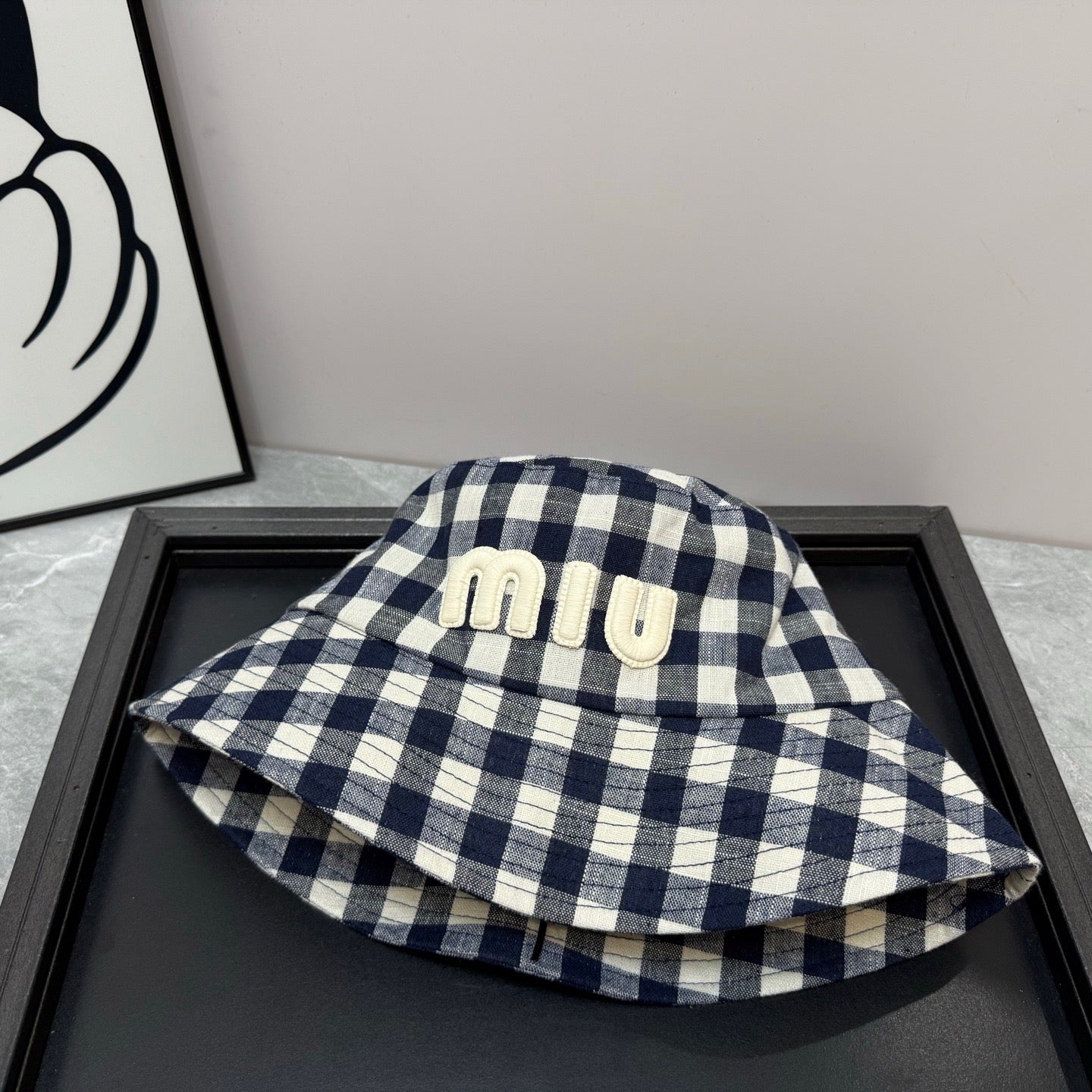 MIUMIU BUCKET CHECKED PATTERN WITH LOGO