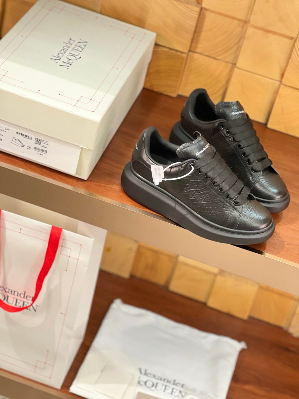 OVERSIZED SNEAKERS IN BLACK TEXTURED LAMBSKIN