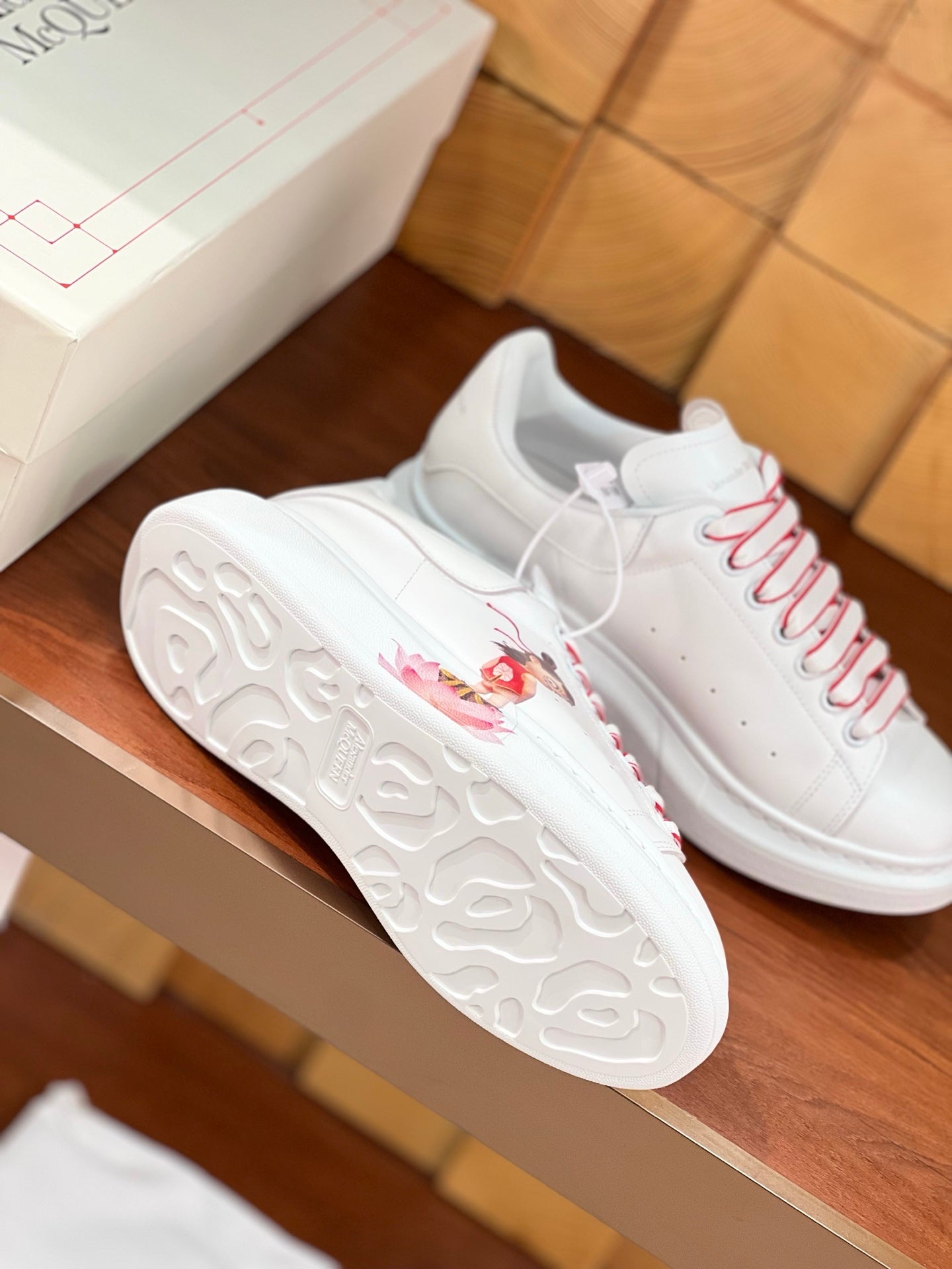 OVERSIZED SNEAKERS IN WHITE CALFSKIN WITH CARTOON FIGURE