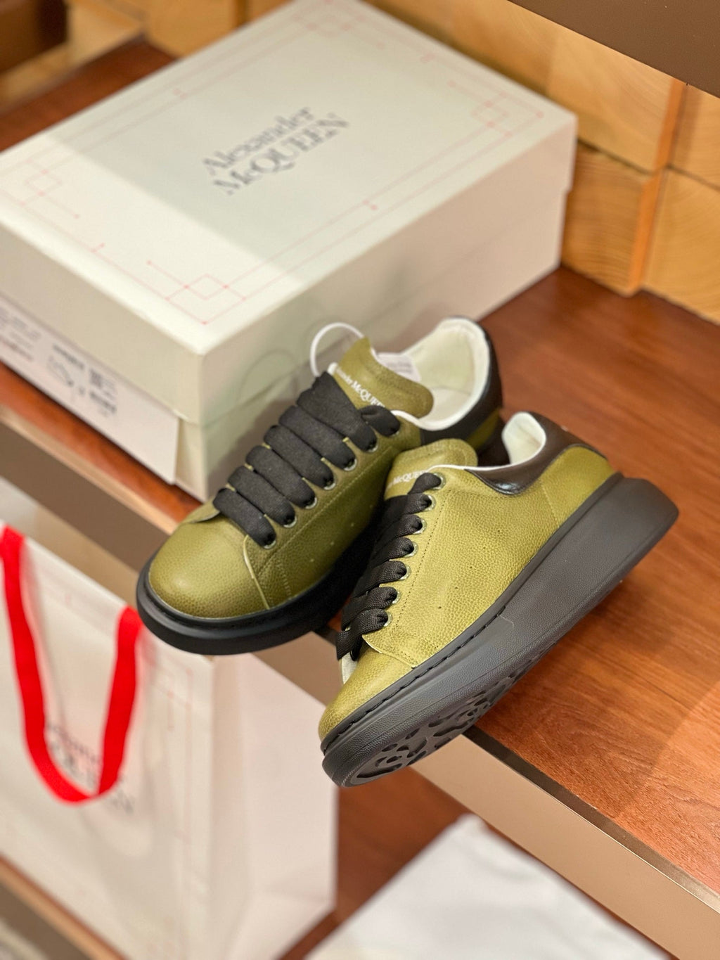OVERSIZED SNEAKERS IN ARMY GREEN CALFSKIN