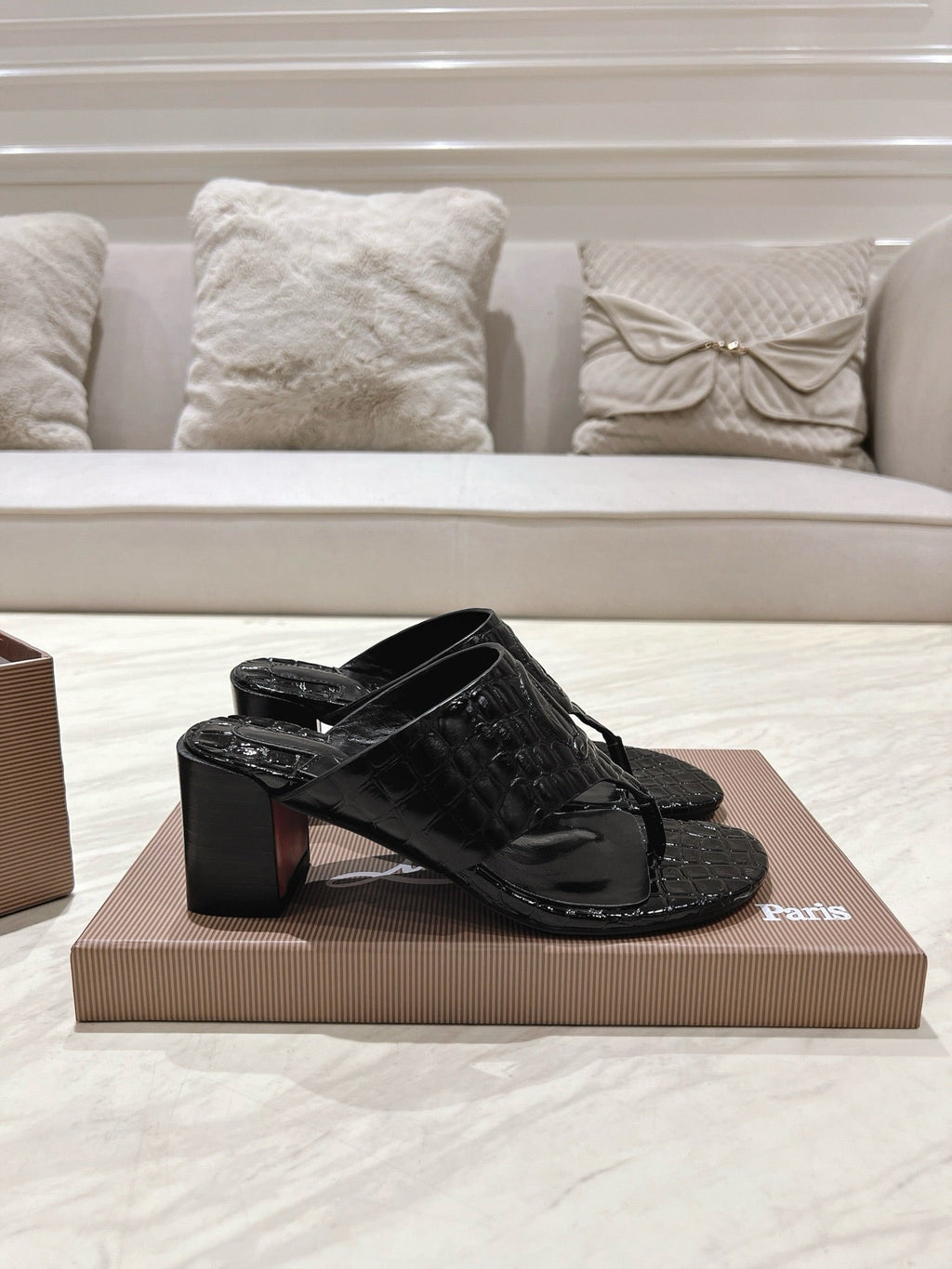 EMBOIDERED LOGO MULES IN BLACK EMBOSSED CALFSKIN