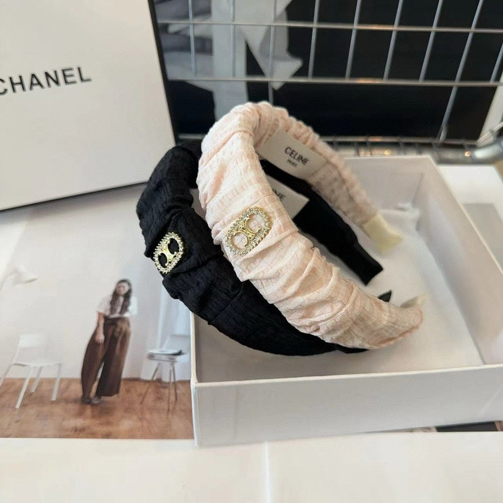 BLACK FABRIC WITH GOLD LOGO HAIRBAND 414448