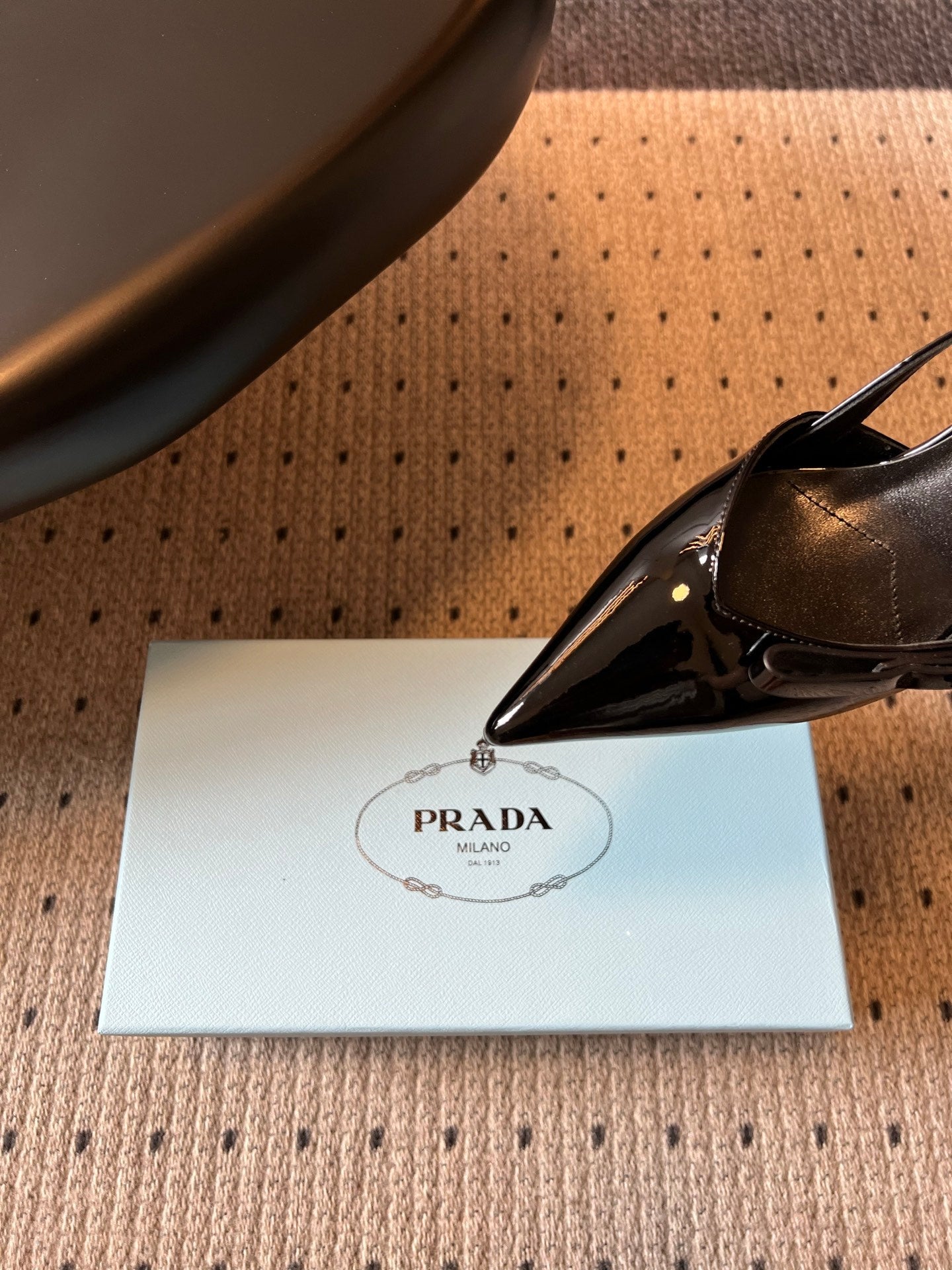 PRADA 26S BOW DETAIL SLINGBACK PUMPS 75MM IN BLACK PATENT CALFSKIN