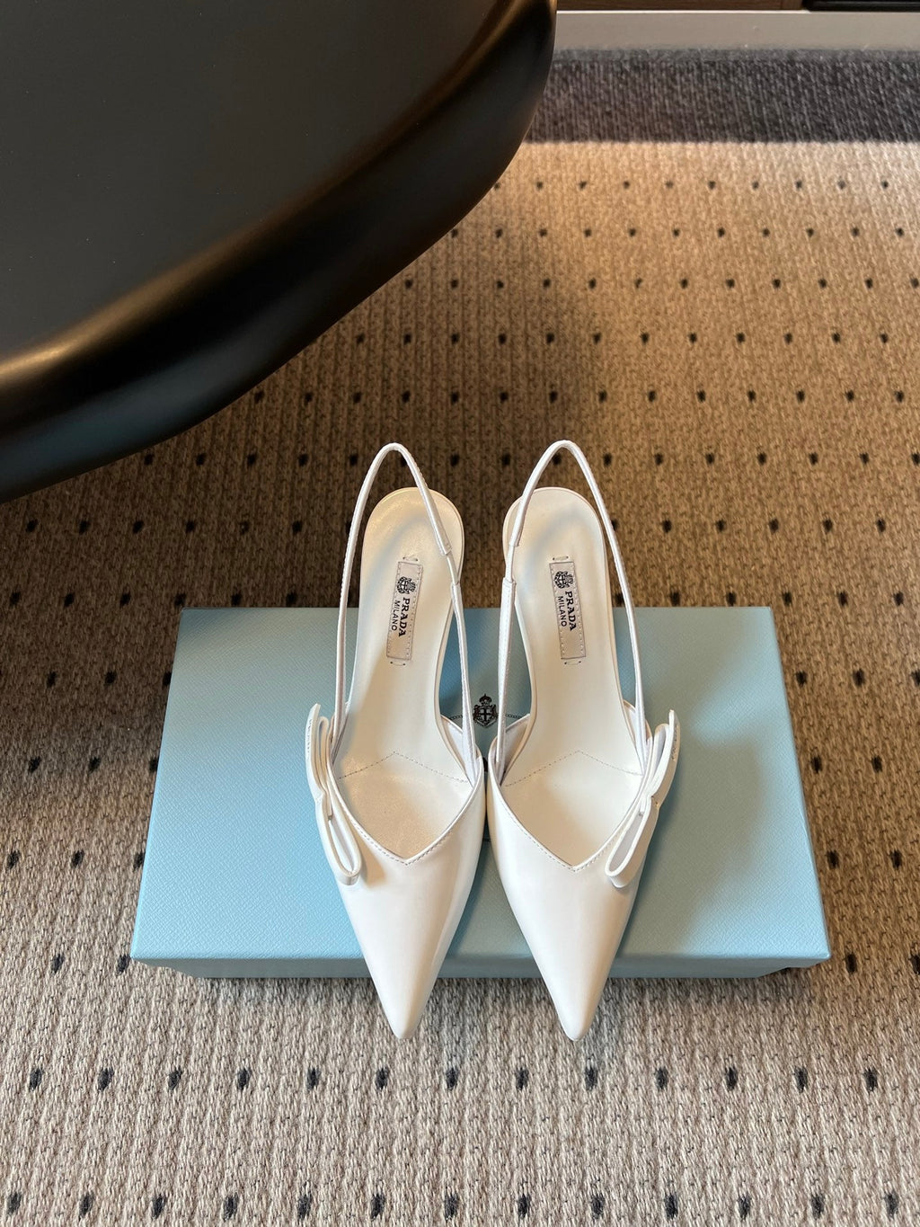 PRADA 26S BOW DETAIL SLINGBACK PUMPS 75MM IN WHITE PATENT CALFSKIN