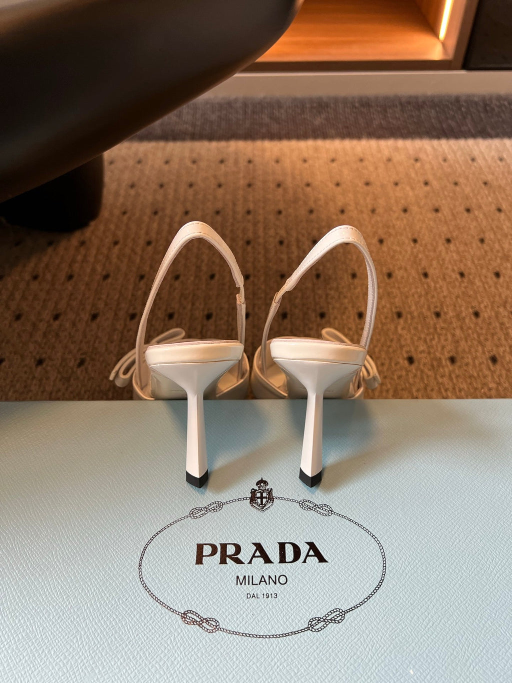 PRADA 26S BOW DETAIL SLINGBACK PUMPS 75MM IN WHITE PATENT CALFSKIN