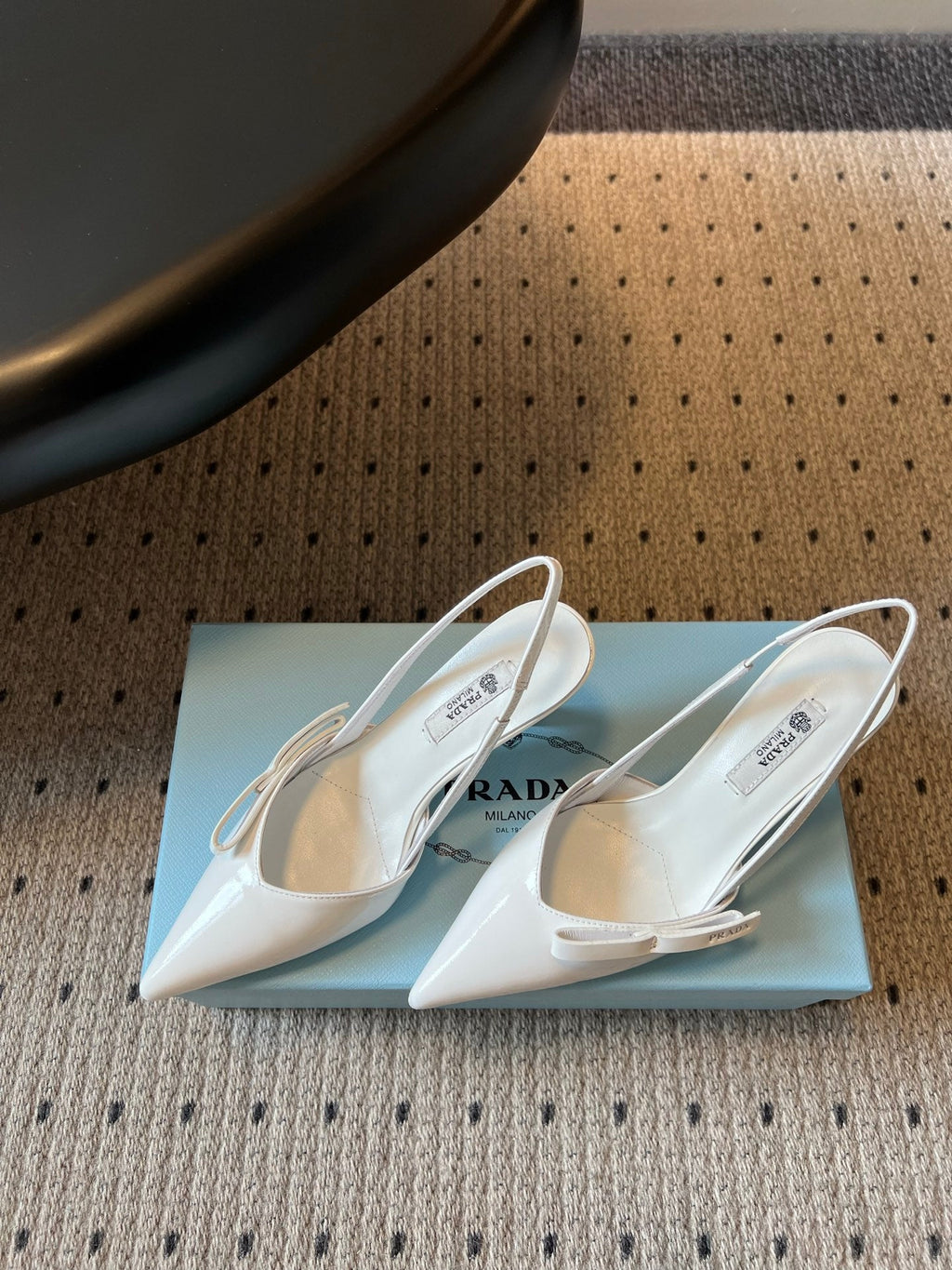 PRADA 26S BOW DETAIL SLINGBACK PUMPS 75MM IN WHITE PATENT CALFSKIN