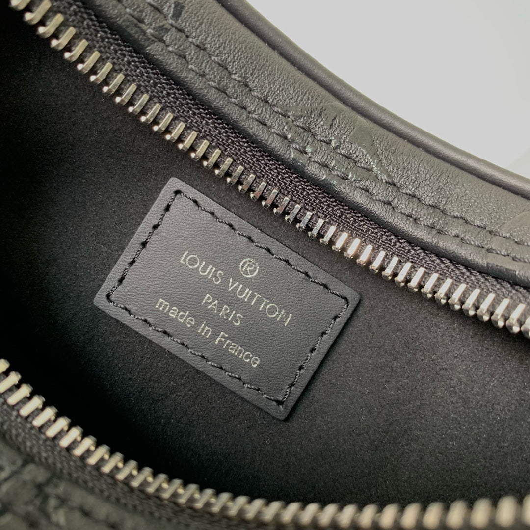LOOP HOBO 23 IN BLACK MONOGRAM EMPREINTE CALFSKIN EMBOSSED LOGO