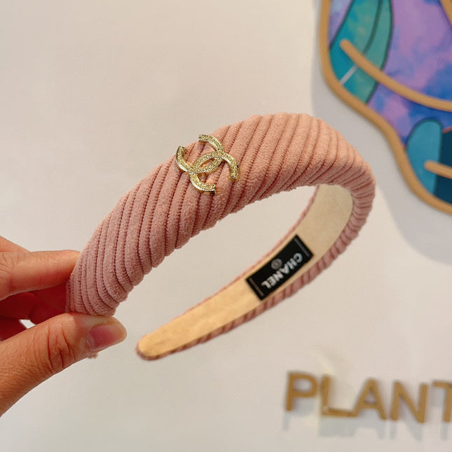 LIGHT PINK FABRIC HAIRBAND WITH GOLD LOGO 414436