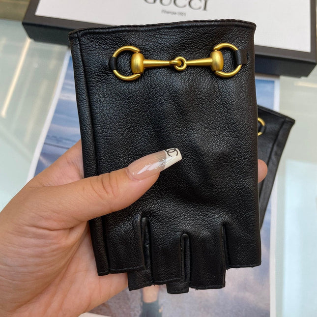 FINGERLESS GLOVES IN BLACK LAMBSKIN WITH GOLD HORSEBIT 432606
