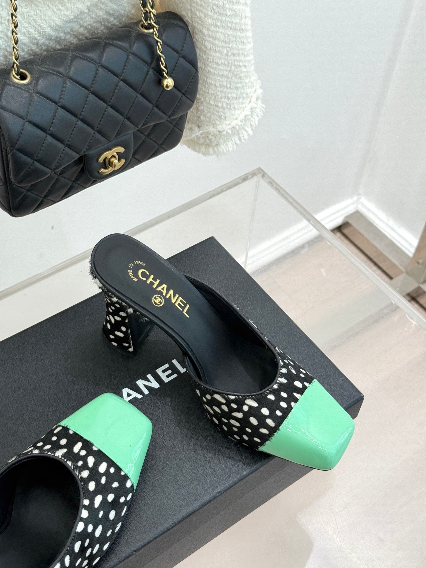 CHANEL POLKA DOT PATTERN MULES IN BLACK MIX GREEN FUR