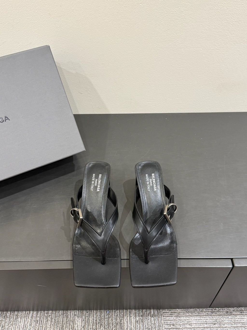 BALENCIAGA 25S HIGH-HEELED FLIP-FLOPS IN BLACK CALFSKIN WITH SILVER HARDWARE