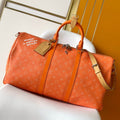 LV 26S KEEPALL 50 IN ORANGE MONOGRAM CANVAS