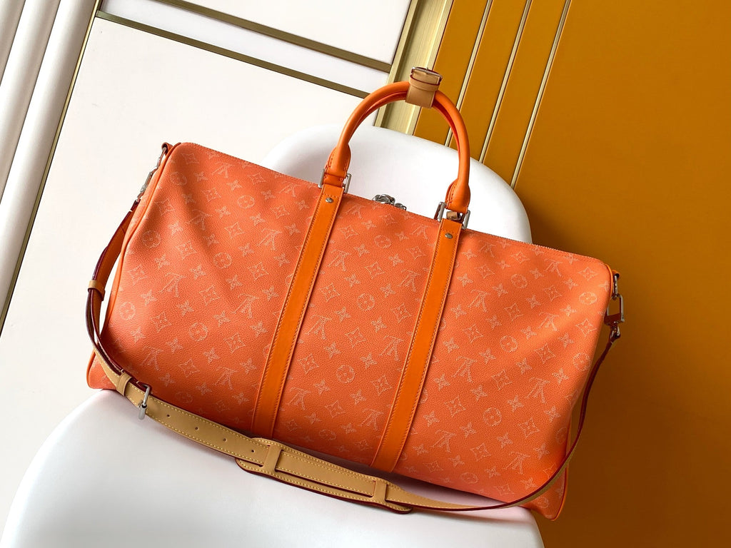 LV 26S KEEPALL 50 IN ORANGE MONOGRAM CANVAS