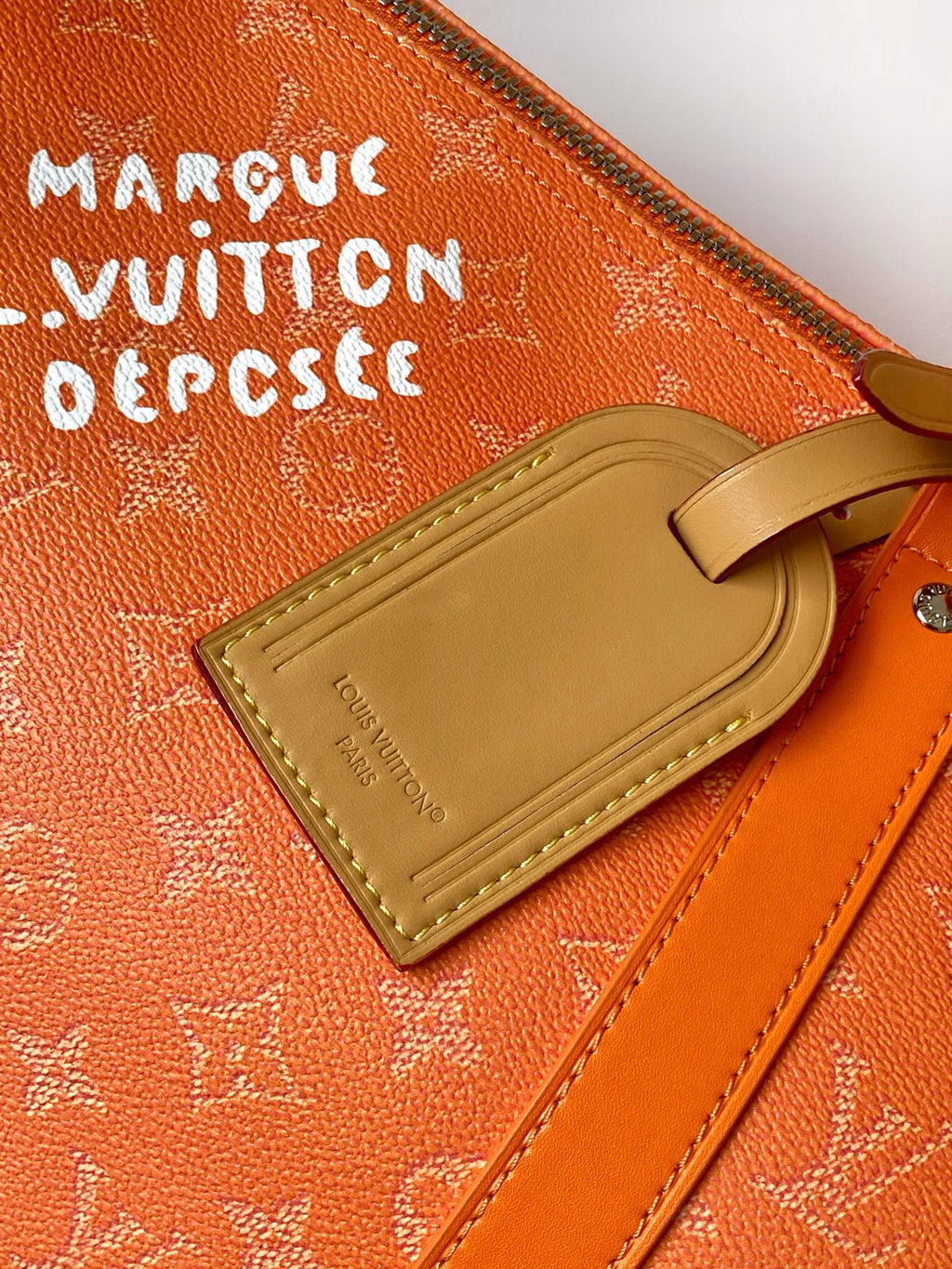 LV 26S KEEPALL 50 IN ORANGE MONOGRAM CANVAS