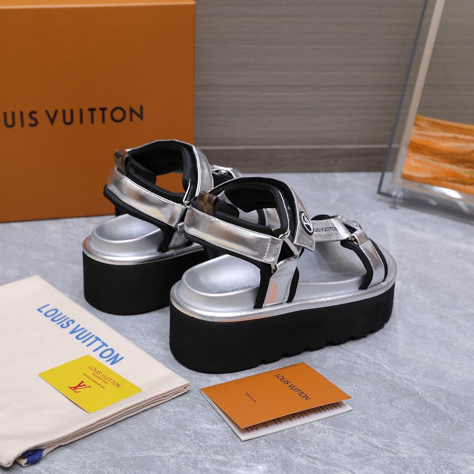 LV 26S CHAMELEON PLATFORM SANDALS 60MM IN SILVER CALFSKIN AND EVA