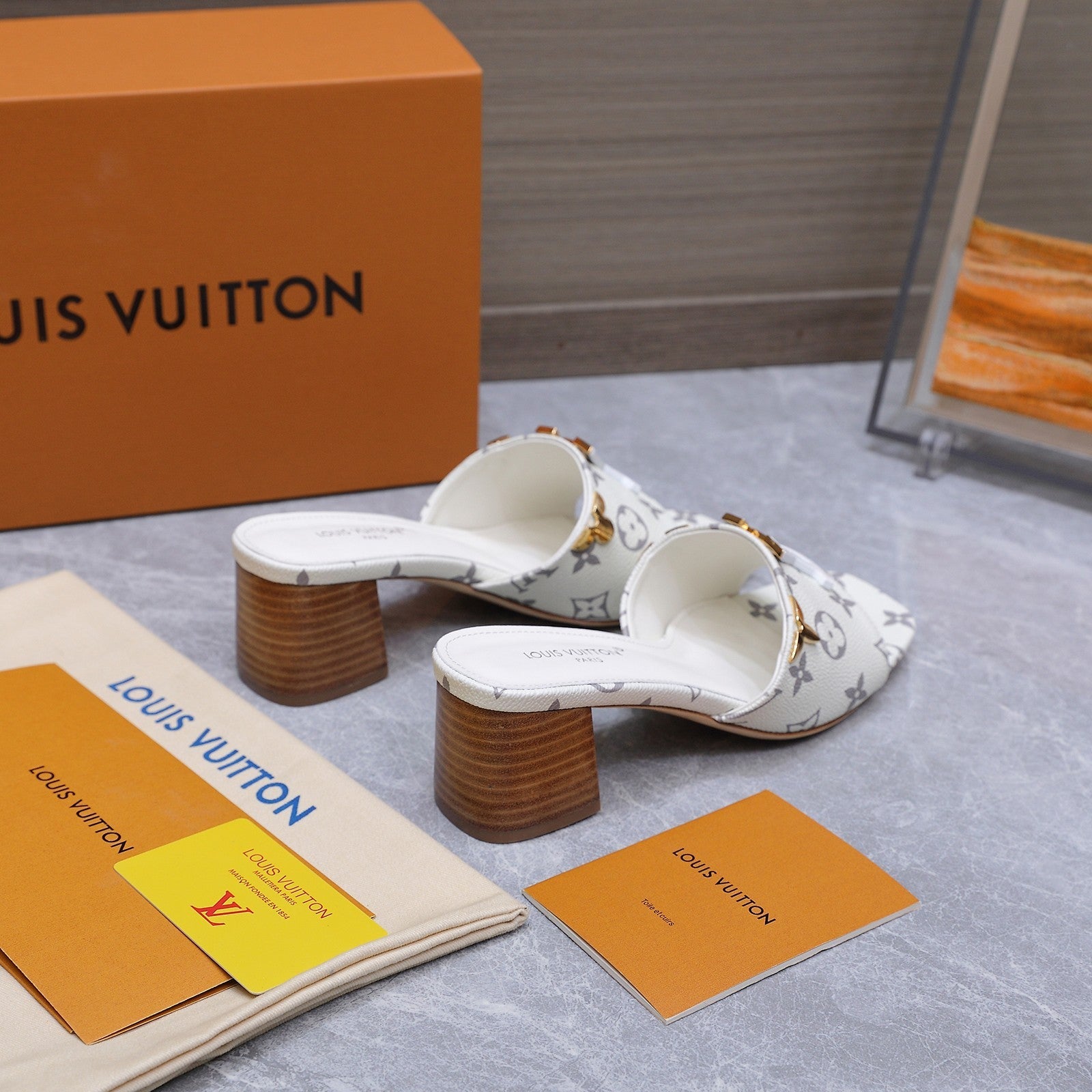 LV 26S BLOCK HEEL MULE SANDALS 55MM IN WHITE MONOGRAM CALFSKIN GOLD HARDWARE