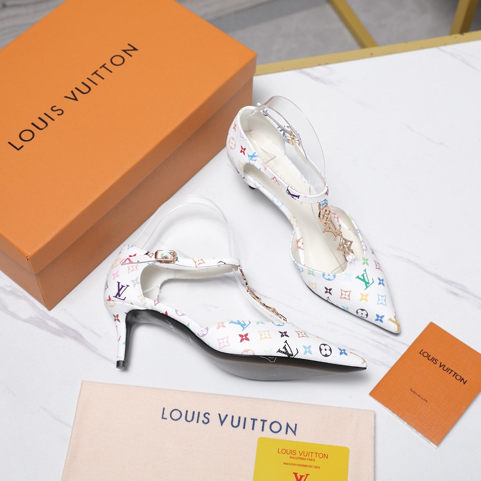 LV 26S ELEGANT T-STRAP HEELS 65MM IN WHITE MULTICOLOR MONOGRAM CALFSKIN GOLD HARDWARE