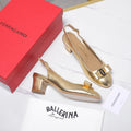 LV 26S SLINGBACK PUMPS 55MM IN GOLD PATENT CALFSKIN WITH BOW