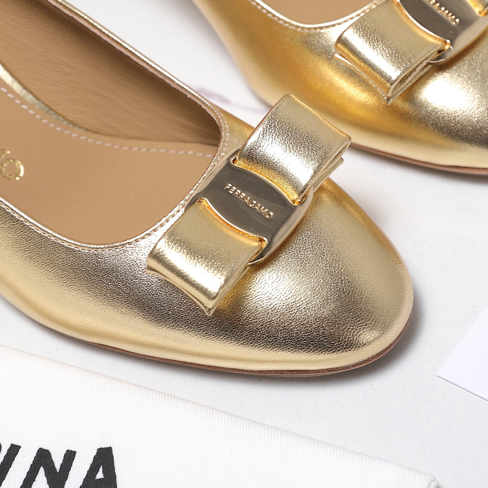 LV 26S SLINGBACK PUMPS 55MM IN GOLD PATENT CALFSKIN WITH BOW