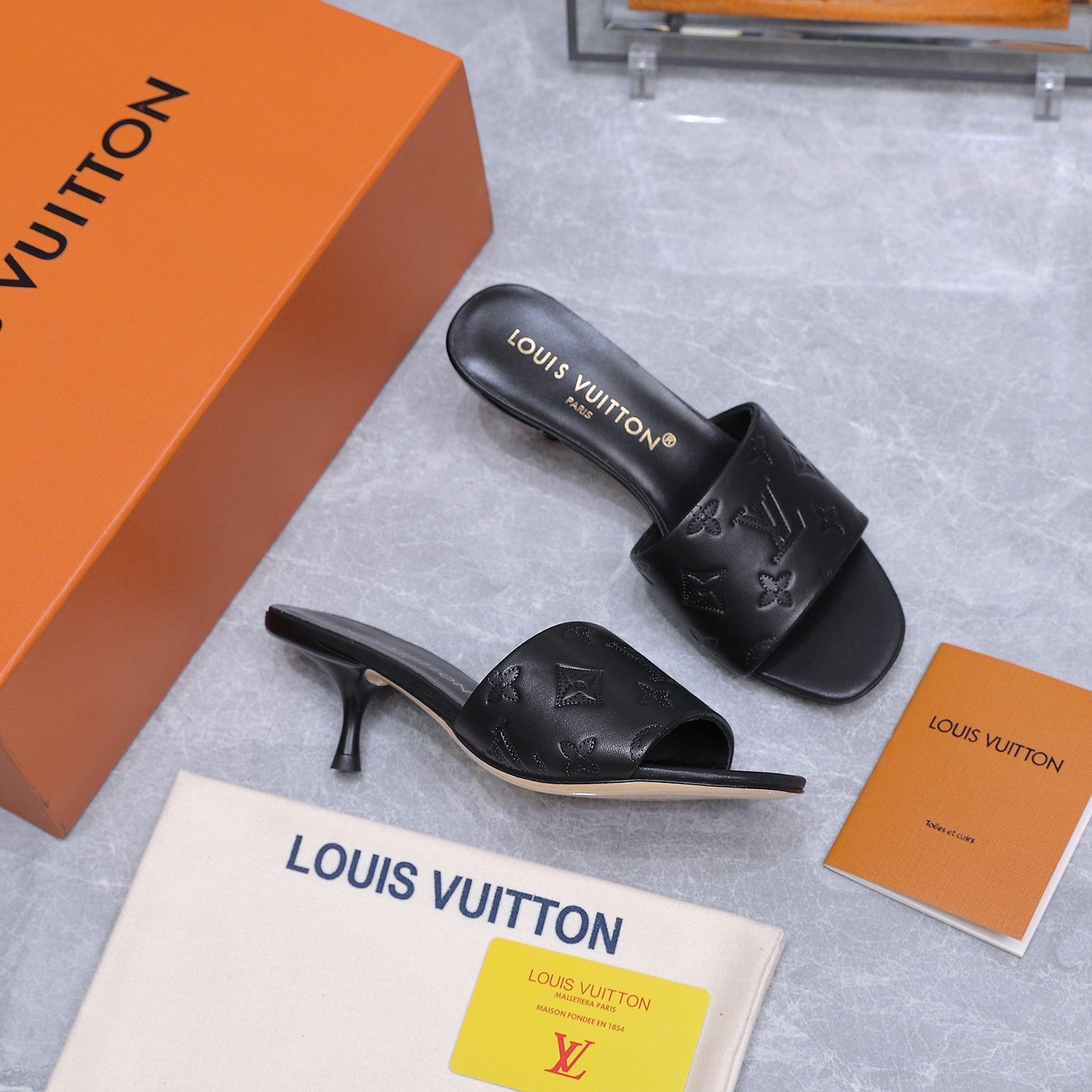 LV 26S 6AM MULE 55MM IN BLACK CALFSKIN EMBOSSED MONOGRAM LOGO