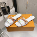LV 26S FLAT MULE SANDALS IN WHITE MULTICOLOR MONOGRAM CANVAS WITH CALFSKIN BOW
