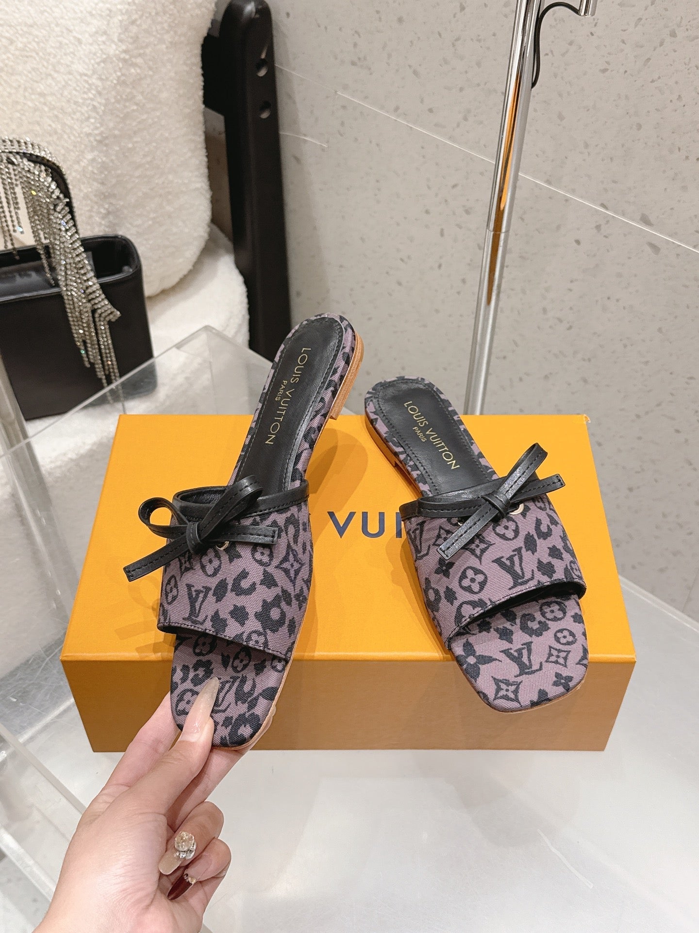 LV 26S FLAT MULE SANDALS IN PURPLE BLACK MONOGRAM CANVAS WITH CALFSKIN BOW