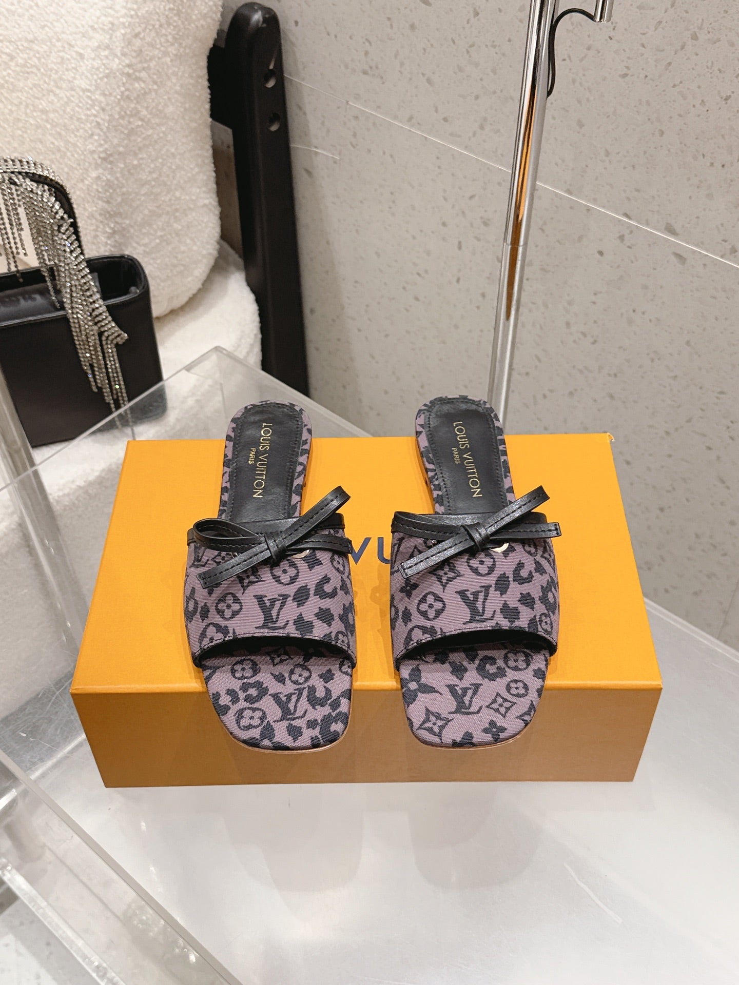 LV 26S FLAT MULE SANDALS IN PURPLE BLACK MONOGRAM CANVAS WITH CALFSKIN BOW