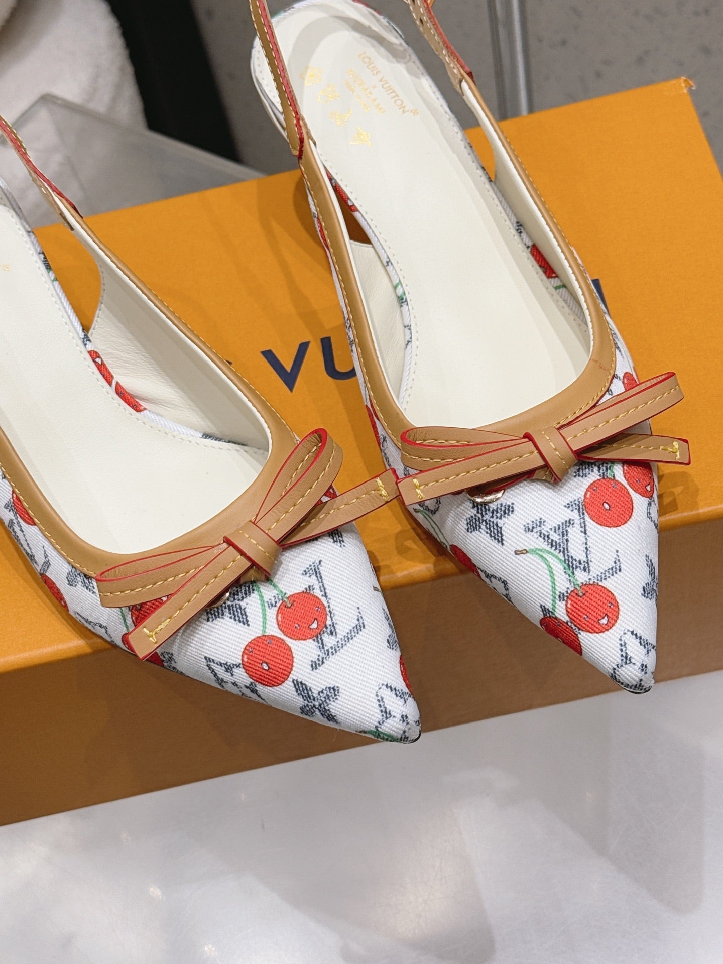 LV 26S SLINGBACK PUMPS IN WHITE MONOGRAM CANVAS WITH CHERRY PRINT AND CALFSKIN BOW