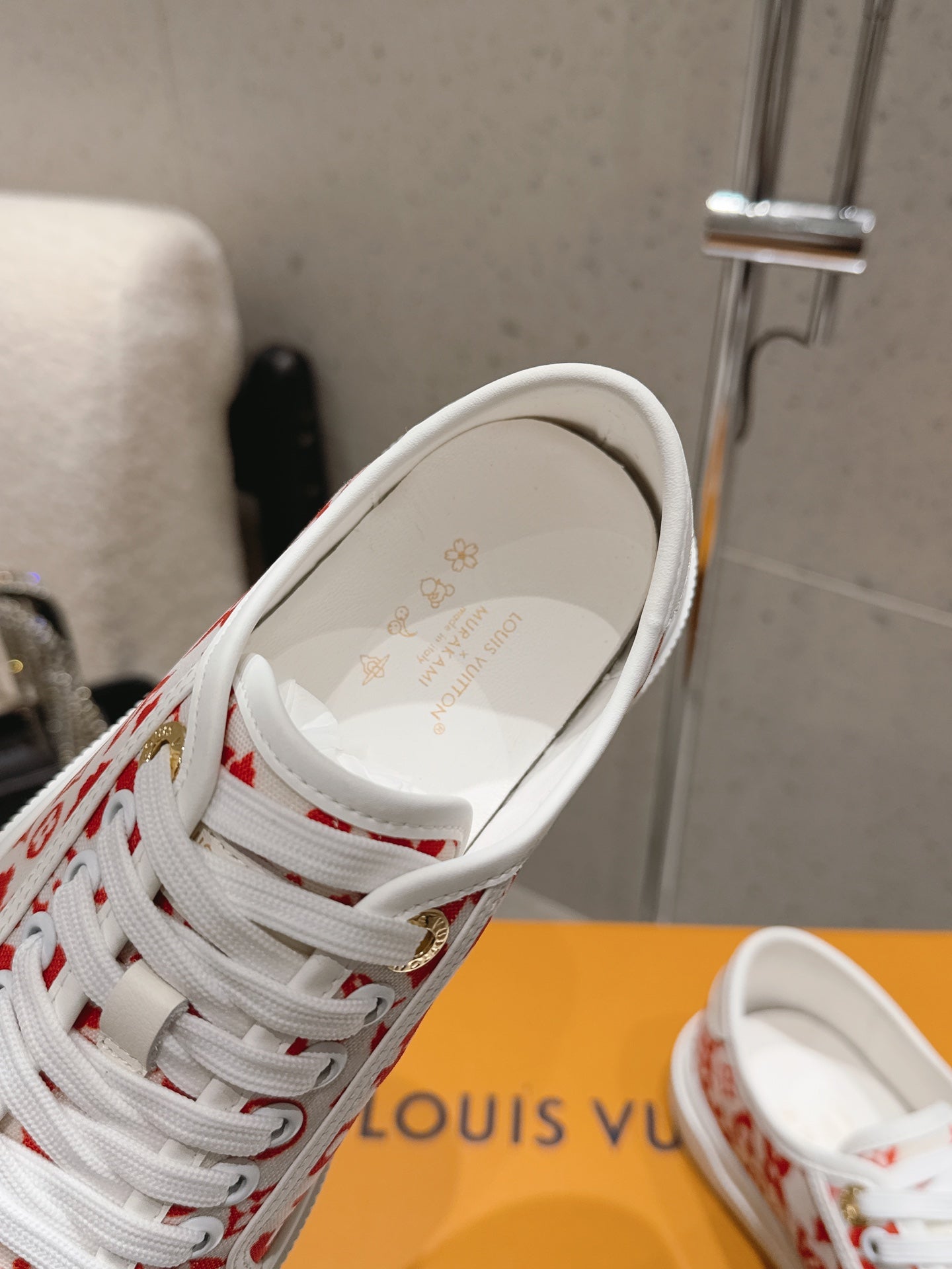 LV 26S LOW TOP SNEAKERS IN RED MONOGRAM CANVAS AND WHITE CALFSKIN TRIM