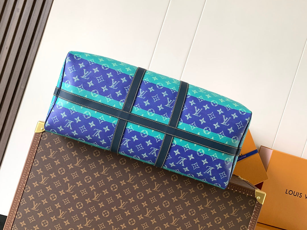 LV 26S KEEPALL 50 IN BLUE WITH LIGHT BLUE ACCENTS COATED CANVAS