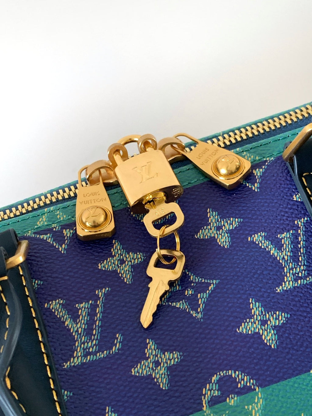 LV 26S KEEPALL 50 IN BLUE WITH LIGHT BLUE ACCENTS COATED CANVAS