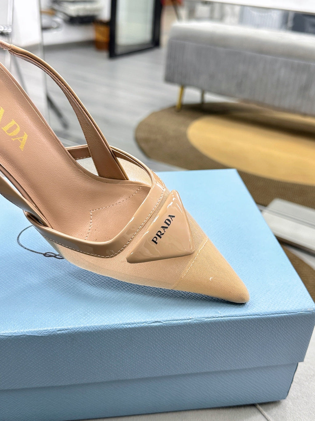 PRADA 25S TRIANGLE LOGO SLINGBACK PUMPS IN BEIGE MESH FABRIC