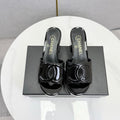 CHANEL 26S BLOCK HEEL SANDALS 100 MM IN BLACK PATENT CALFSKIN