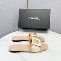 CHANEL 26S WOVEN STRAP SLIDES IN BEIGE AND ORANGE LAMBSKIN