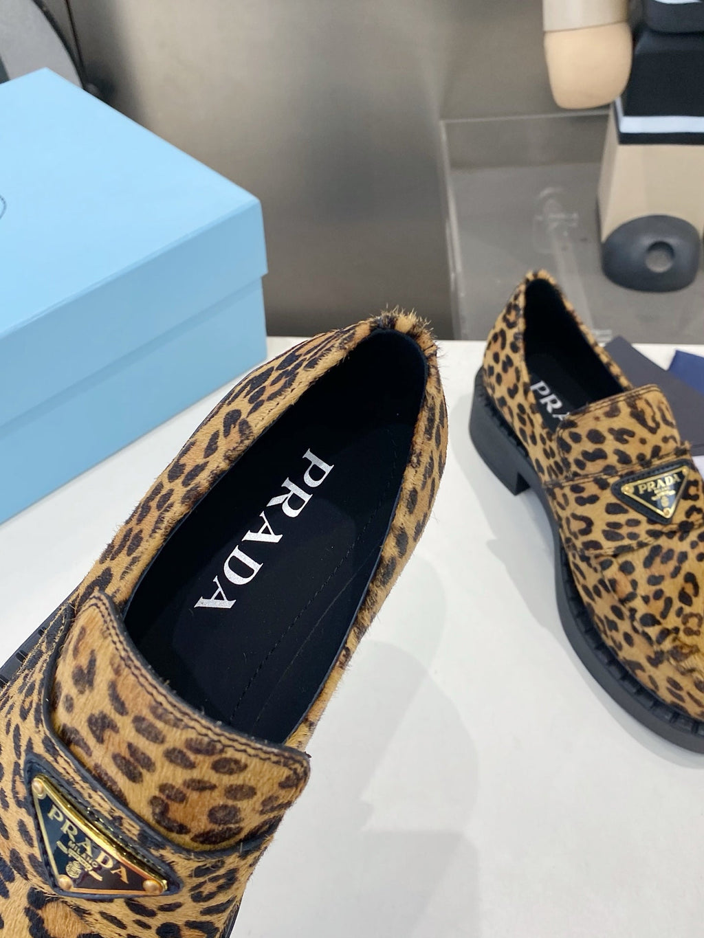 PRADA 26S LOAFERS IN BROWN LEOPARD PRINT PONY HAIR
