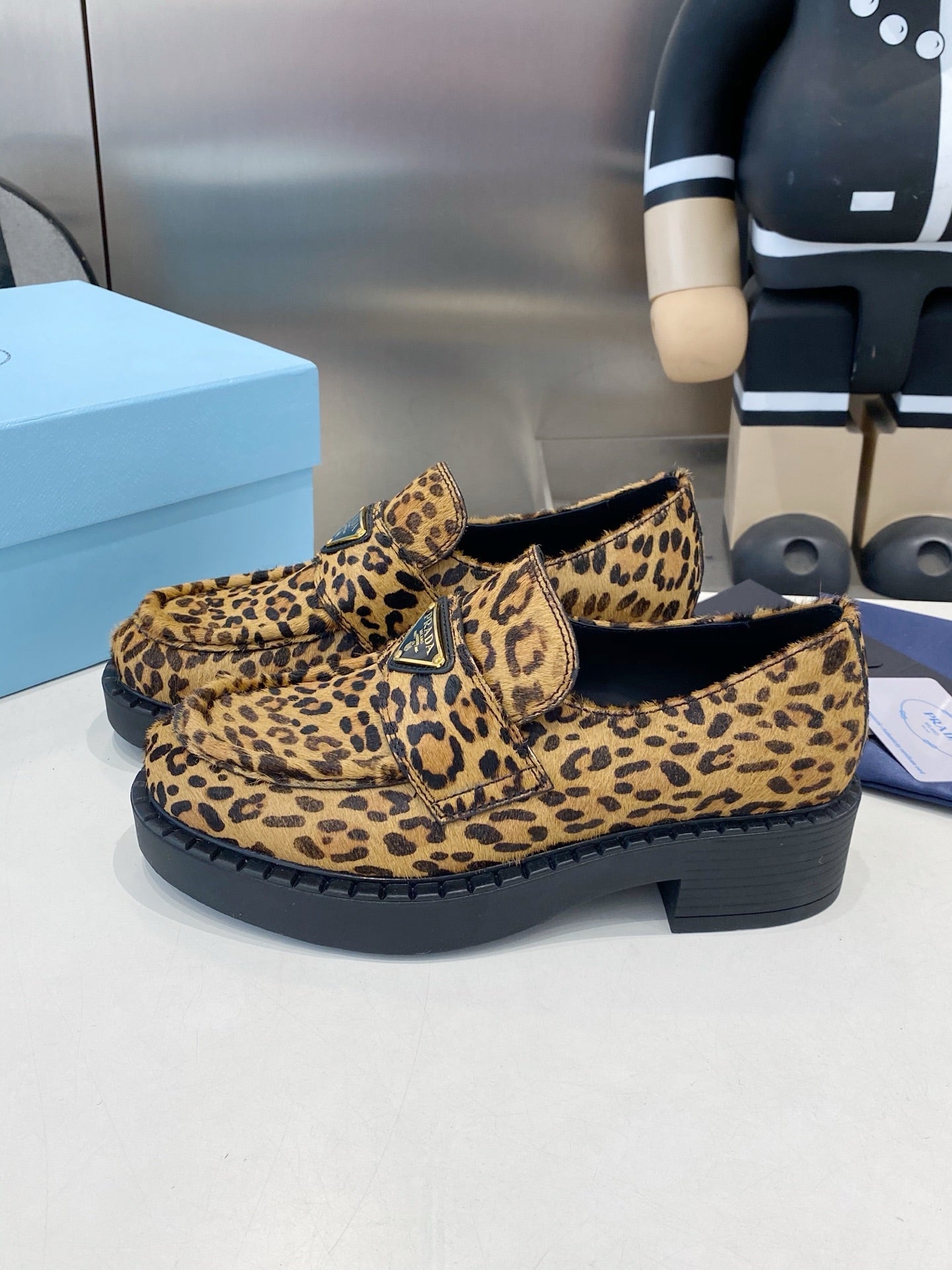 PRADA 26S LOAFERS IN BROWN LEOPARD PRINT PONY HAIR