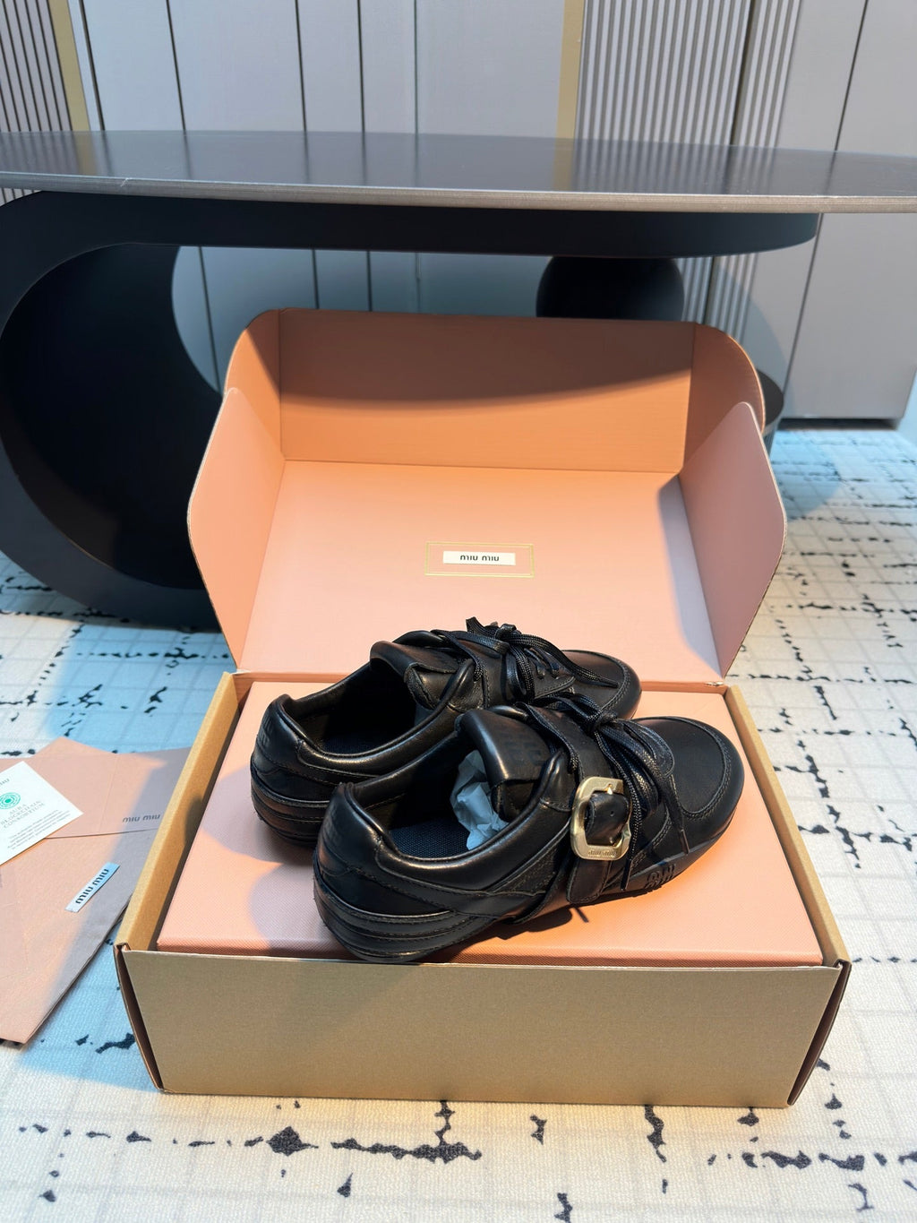 MIUMIU 26S LACE UP SNEAKERS IN BLACK CALFSKIN BUCKLE STRAP DETAIL