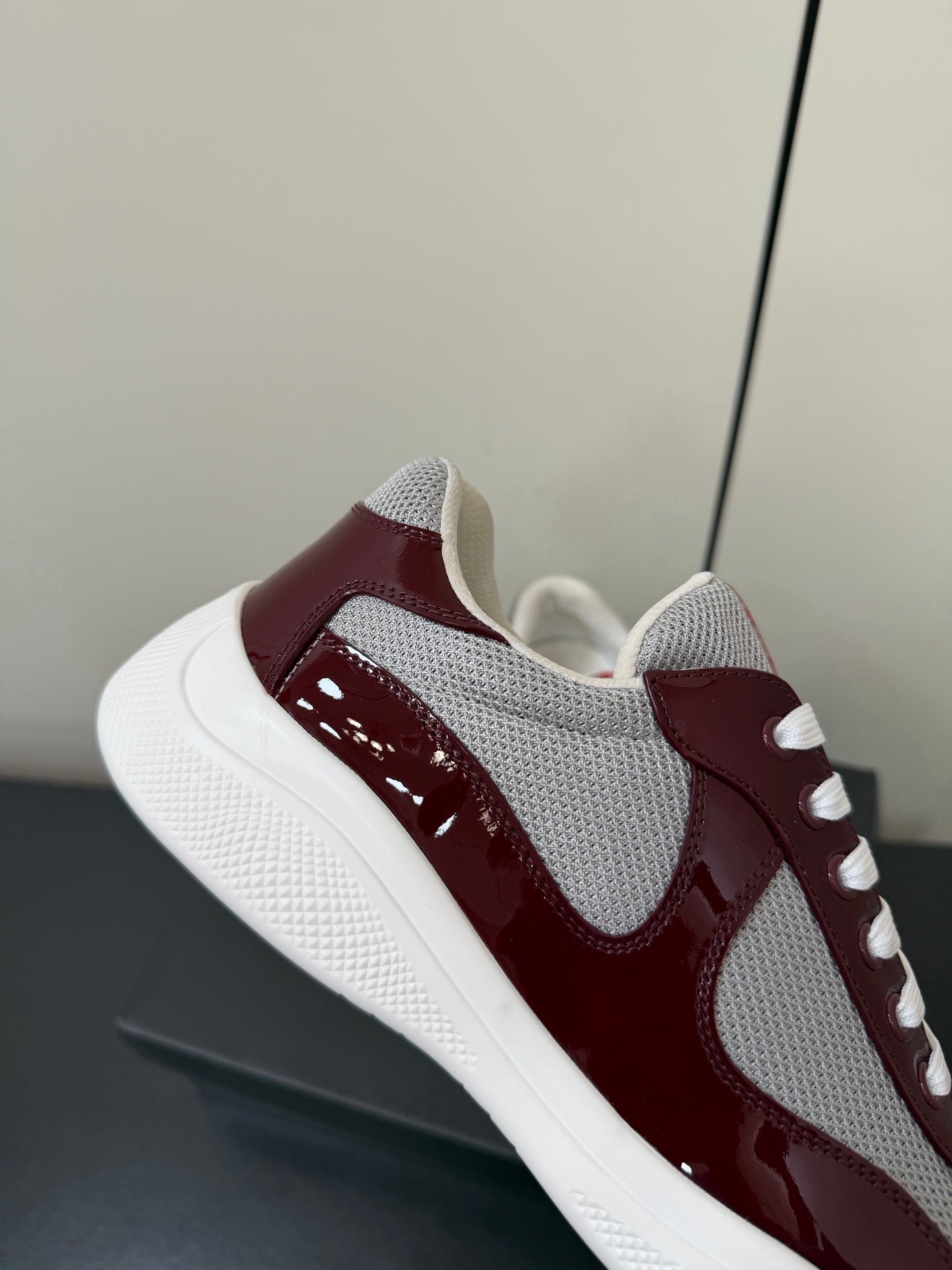 PRADA 26S SNEAKERS IN BURGUNDY RED PATENT CALFSKIN AND WHITE MESH