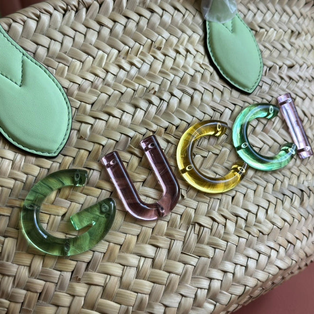 SMALL TOTE BAG 26 WITH LOGO IN NATURAL-COLORED STRAW AND LIGHT GREEN CALFSKIN HANDLE
