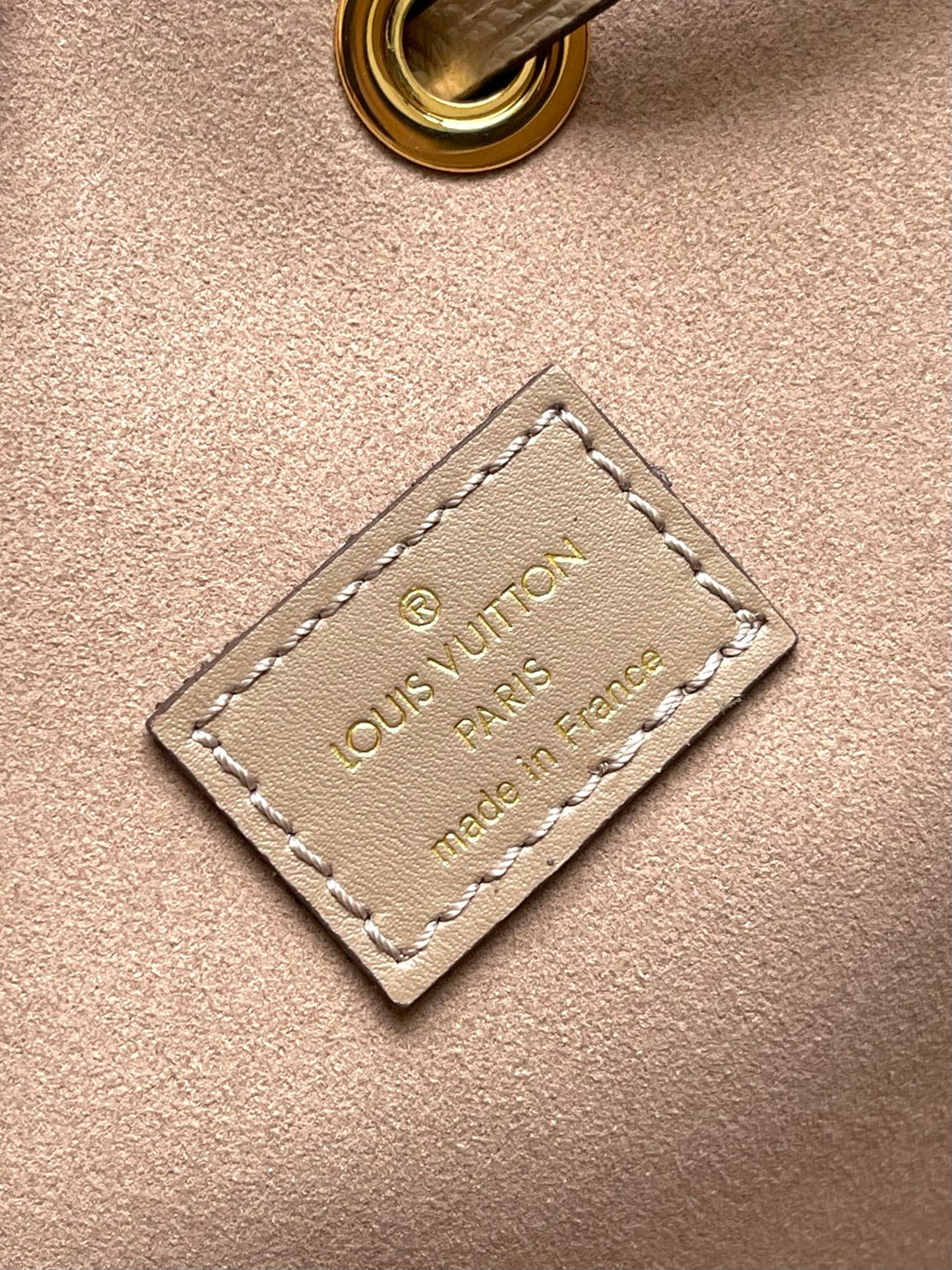 CRAFTY NEONOE 26 IN BROWN AND CREAM BICOLOR EMPREINTE CALFSKIN