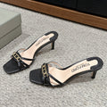 WHITNEY HIGH 6 CM MULE IN BLACK CROCODILE LEATHER