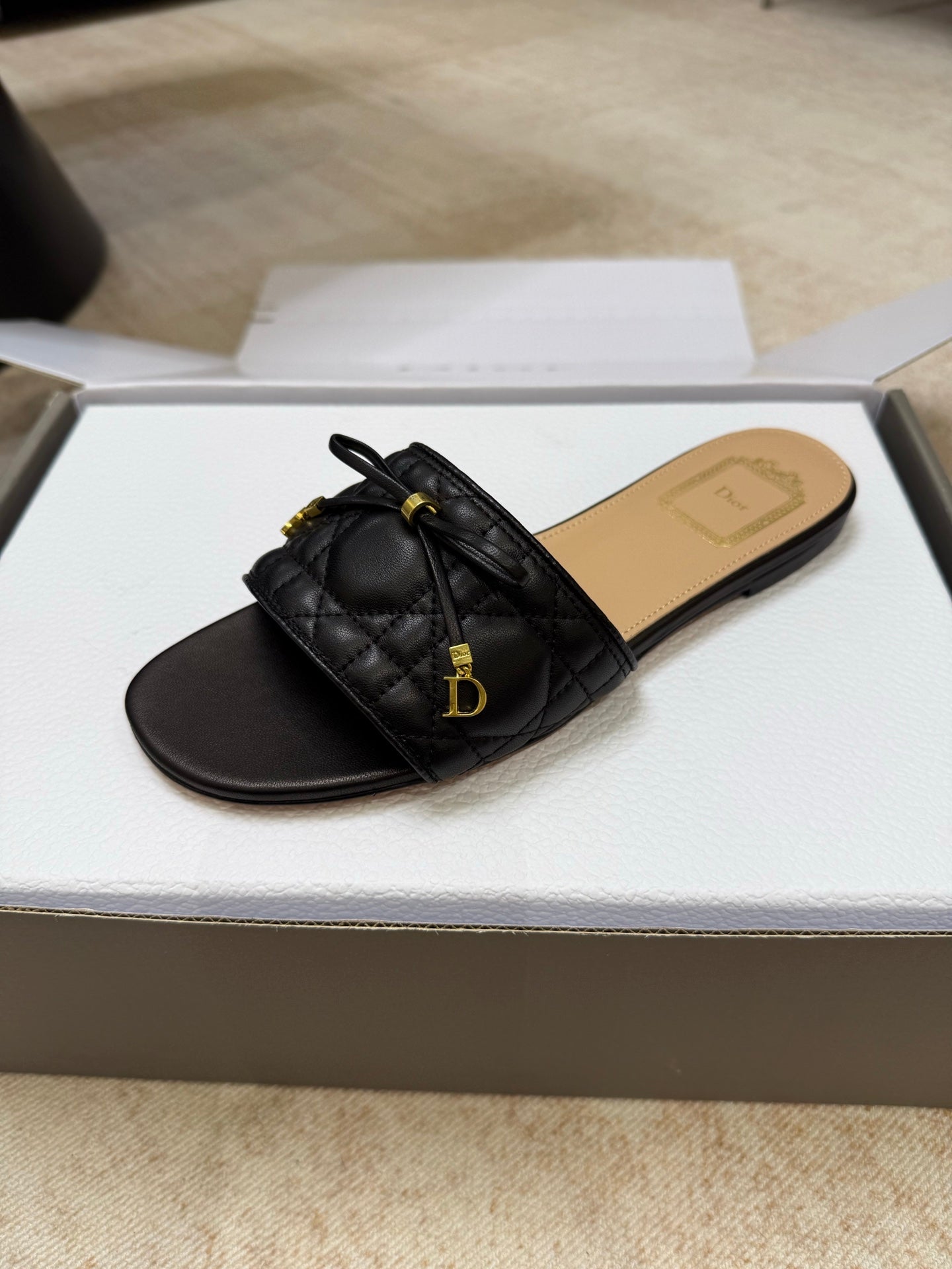 DIOR 26S DWAY CANNAGE SLIDE IN BLACK LAMBSKIN